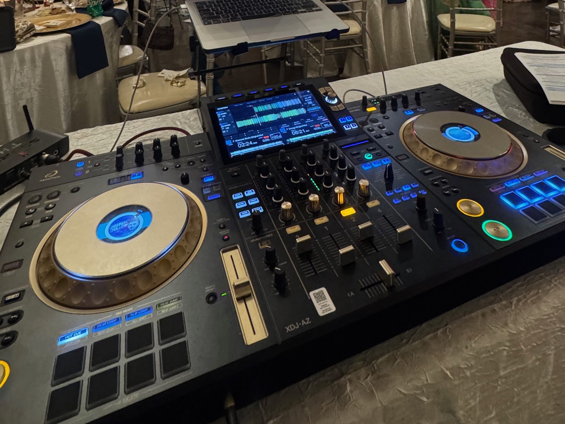 An AlphaTheta XDJ-AZ all-in-one system on the booth at a Dallas wedding reception